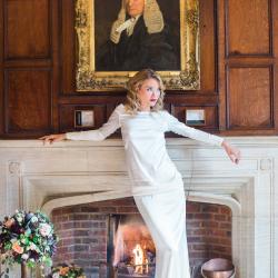 Bride by fireplace